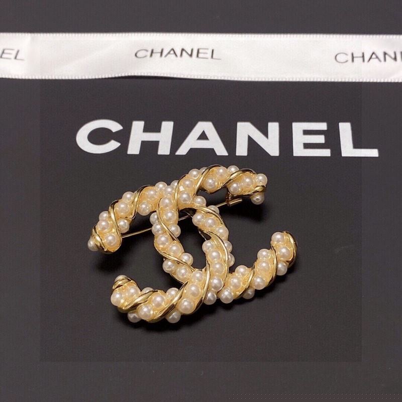 Ch*el brooches